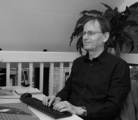 Rory Downes working at a desk