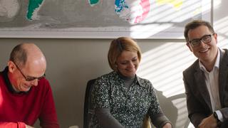 TOBIN ALDRICH, IMOGEN WARD and STEVEN RAMSAY sitting at a conference table